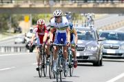 Rohan Dennis-Uni SA leads early breakaway grpoup up highway Image