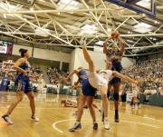 Alison Downie-Dandenong Rangers- flies through air while Liz Cambage shoots-Kathleen Macleod injured Image