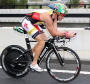 Craig Alexander Time Trials along East link on way to Victory Image