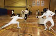Chloe Esposito lunges at Ed Fernon-Aus Olympic Fencing Training- Image