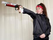 Chloe Esposito takes aim with Laser pistol Image
