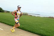 Craig Alexander-Ironman Run leg by bay near Brighton Image